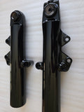 Fork Lowers Gloss Black (2024-2026 Street Glides and Road Glides)